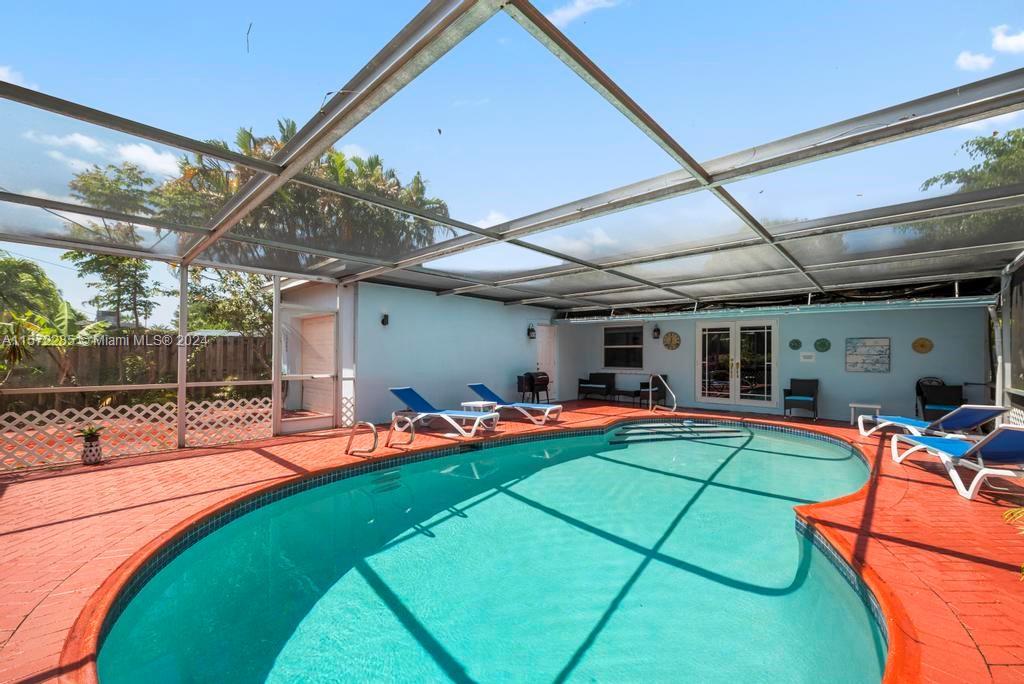 Well maintained  3 Bed/2 Bath pool home in the heart of Hollywood Hills. Oversized Florida room, gre