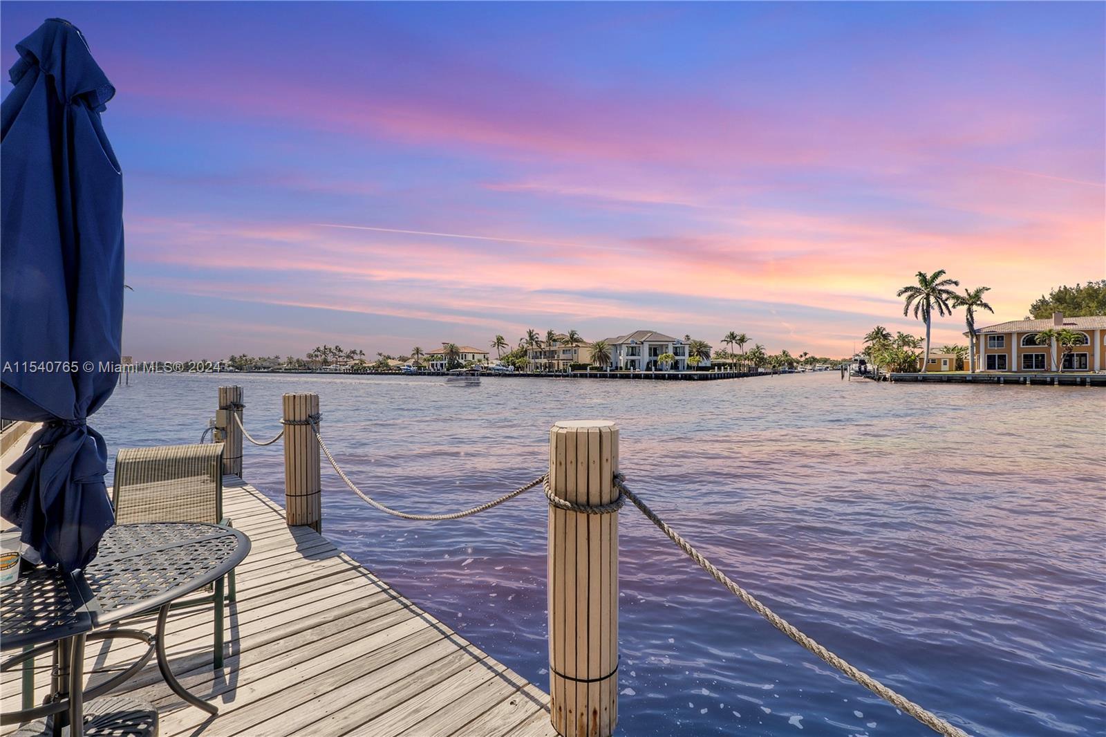 Sunset lovers dream in Moonlit Waters Co-Op low-key building, located directly on the waterfront of 