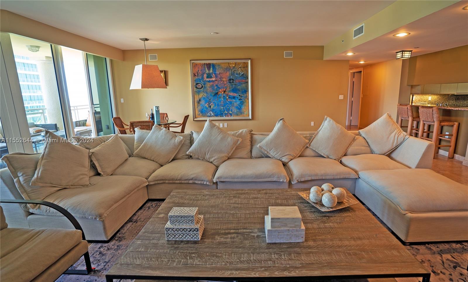 The generously sized 4/4 unit, measuring an impressive 2,930 sf, WITH OCEAN VIEWS, presents a grand 