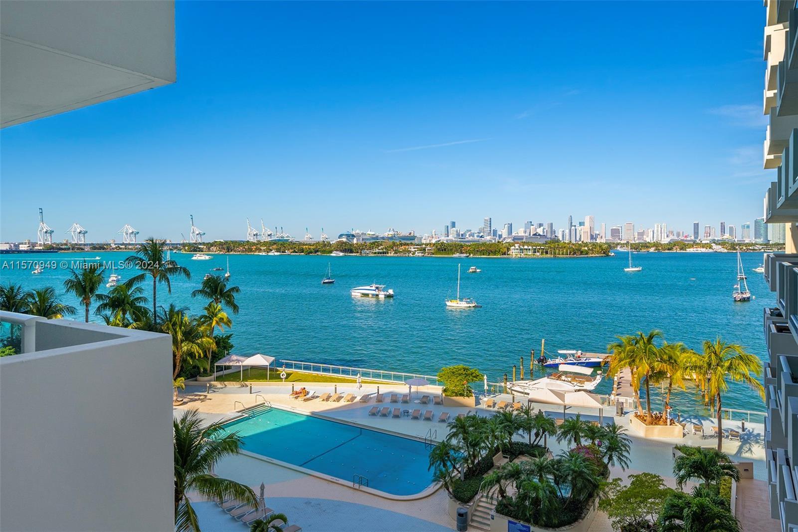 Stunning and expansive direct bay and Miami skyline views greet you upon entering unit 601. This tra