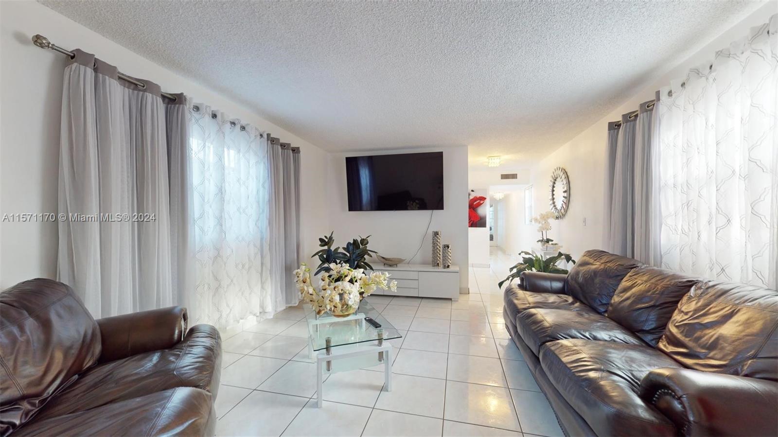 Welcome to this unique home in a desirable Hialeah neighborhood. This charming residence boast 3 bed