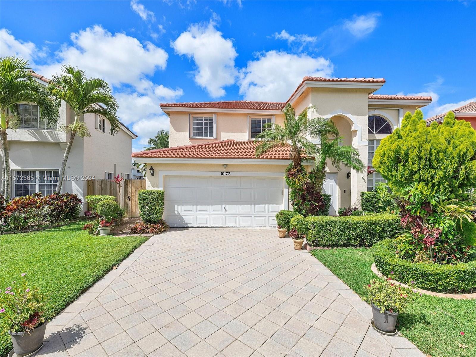 Located in West Kendall's Forest Lakes community, this exceptional 5/3 home features fantastic lake 