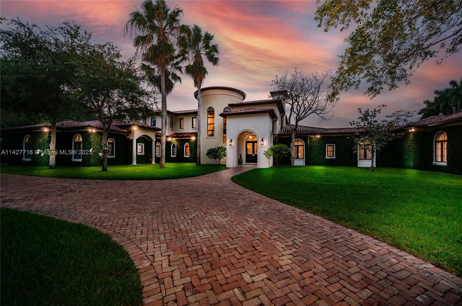 Nestled in a quiet no thru street is this magnificent custom-built estate in sought after Pinecrest.