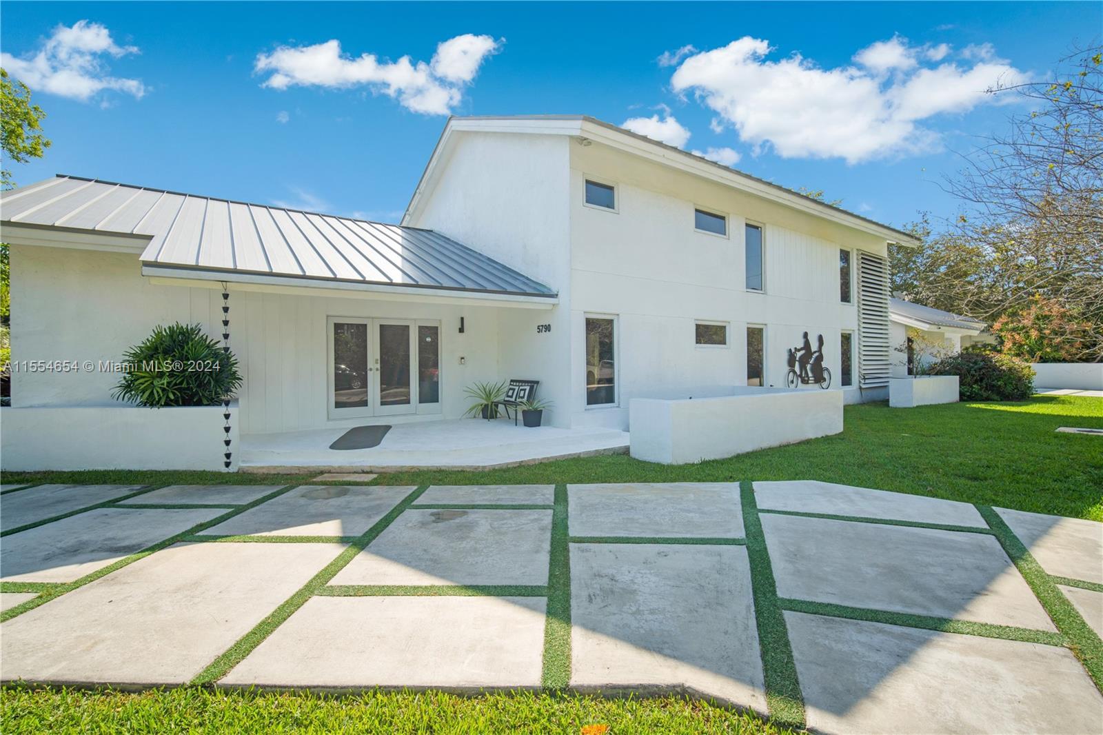Gorgeous South Miami Home renovated to perfection! Enter this one-of-a-kind beauty with 6 Bedrooms, 