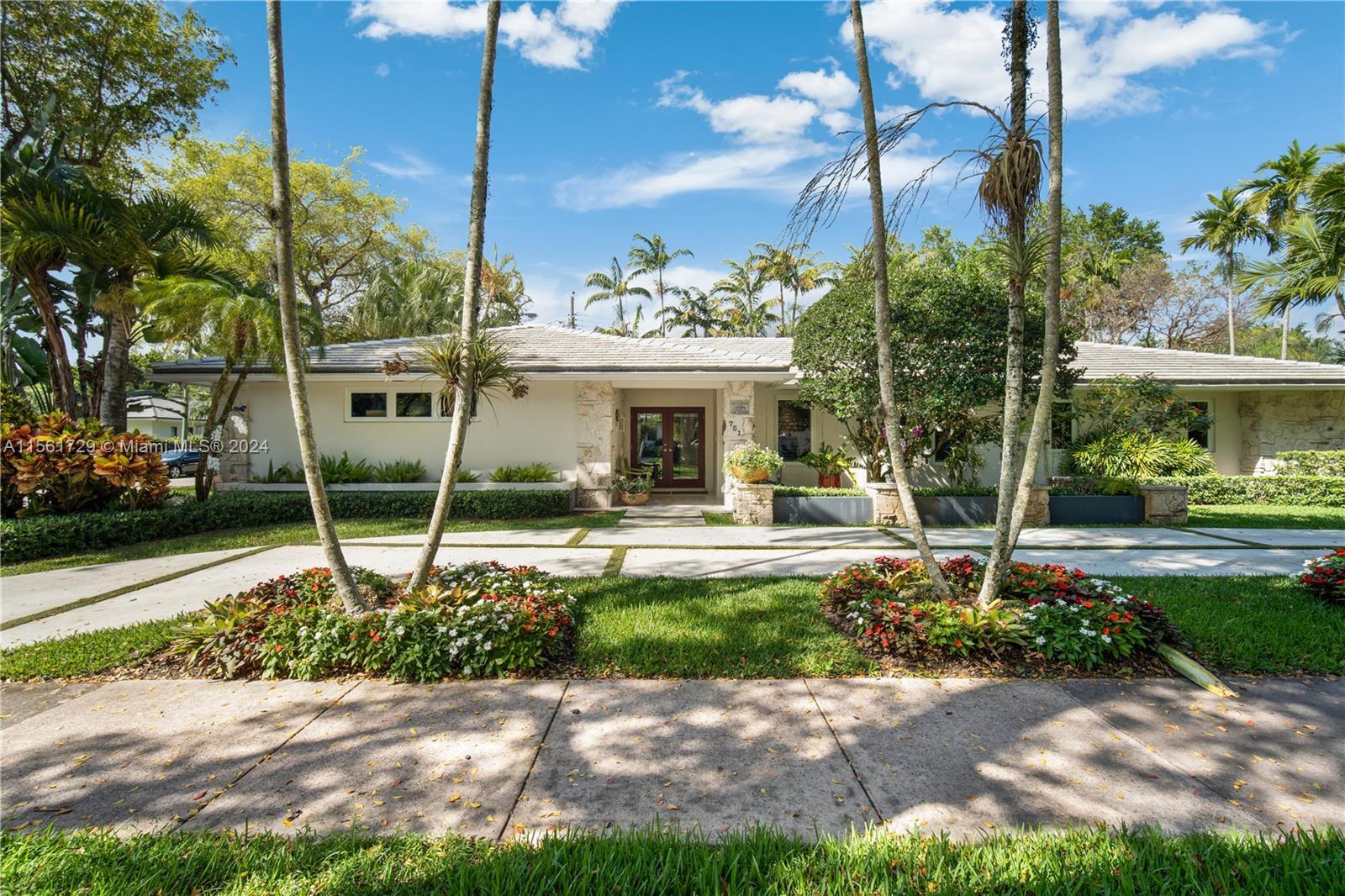 Sought after South Gables Location! Enter this lushly landscaped  5 bedroom / 4 bath gem which featu