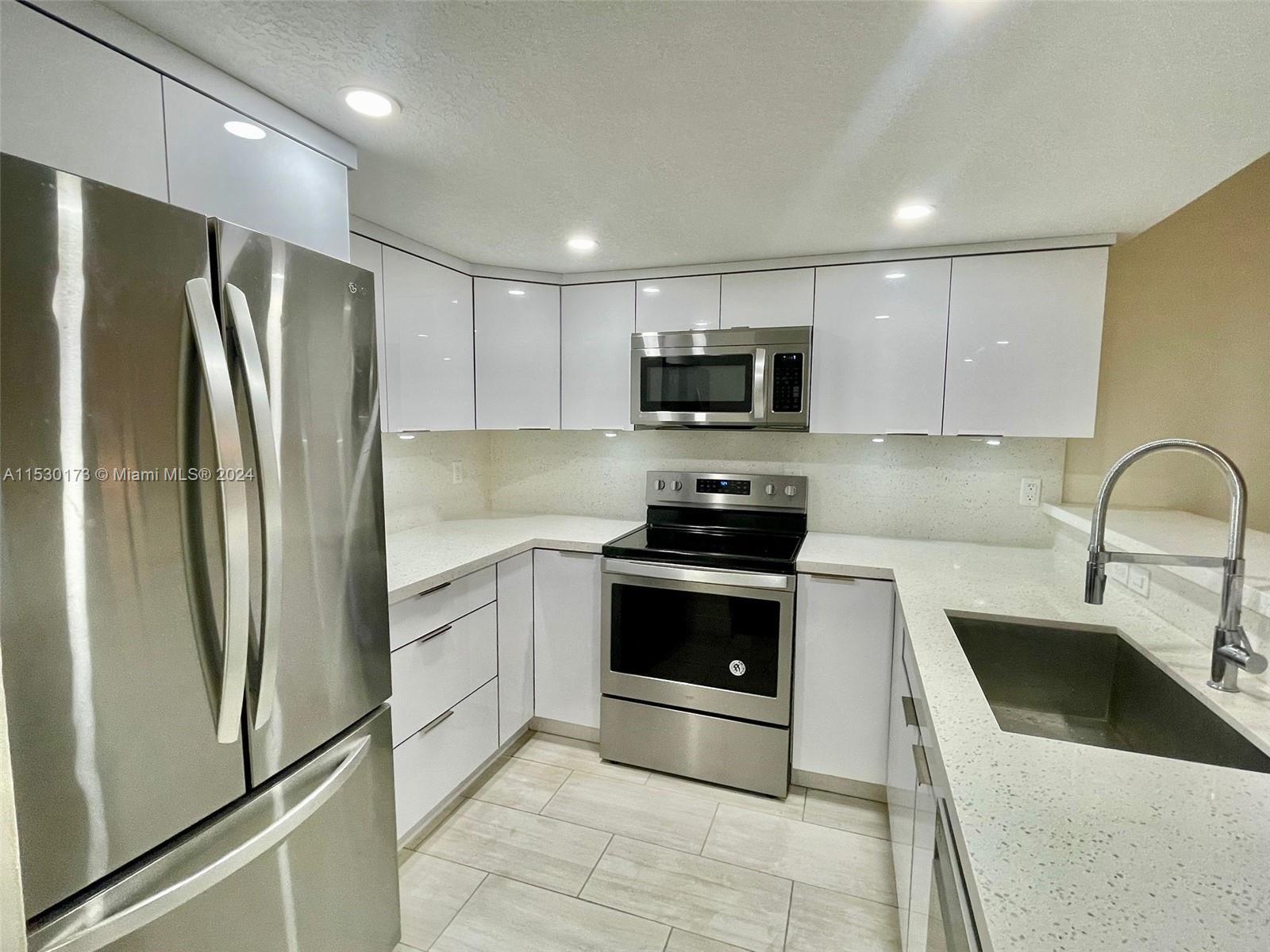 Motivated Seller who's relocating out of State! FULLY REMODELED!! 2 BEDROOMS/ 2 BATHROOMS. CORNER UN