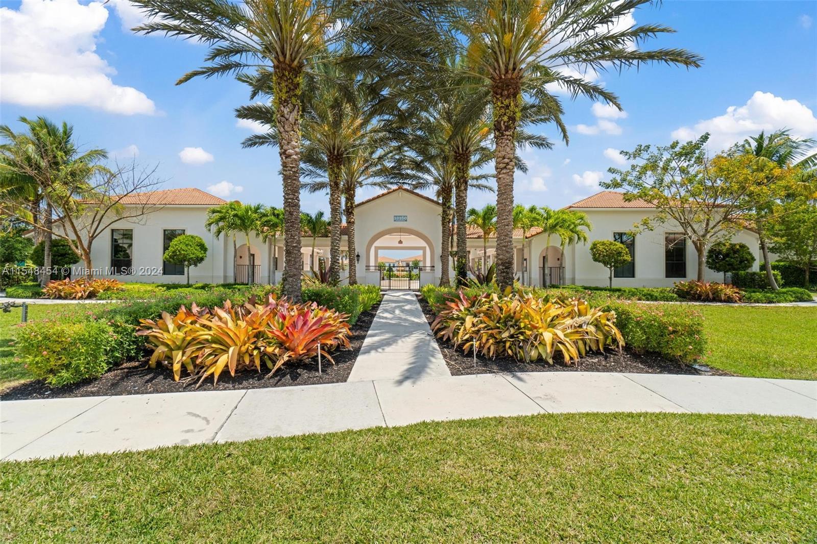 Luxurious townhome in exclusive Enclave gated community at Boca Dunes. Spacious  3 Bed, 2.5 Bath. Be
