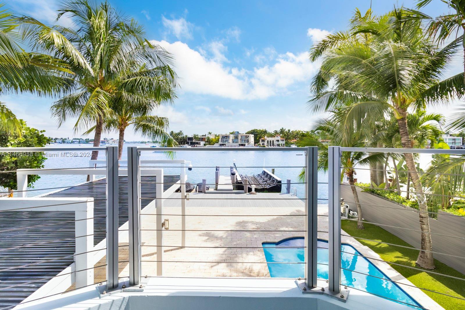 This spectacular waterfront home has been totally renovated with a construction upgrade of a new ent