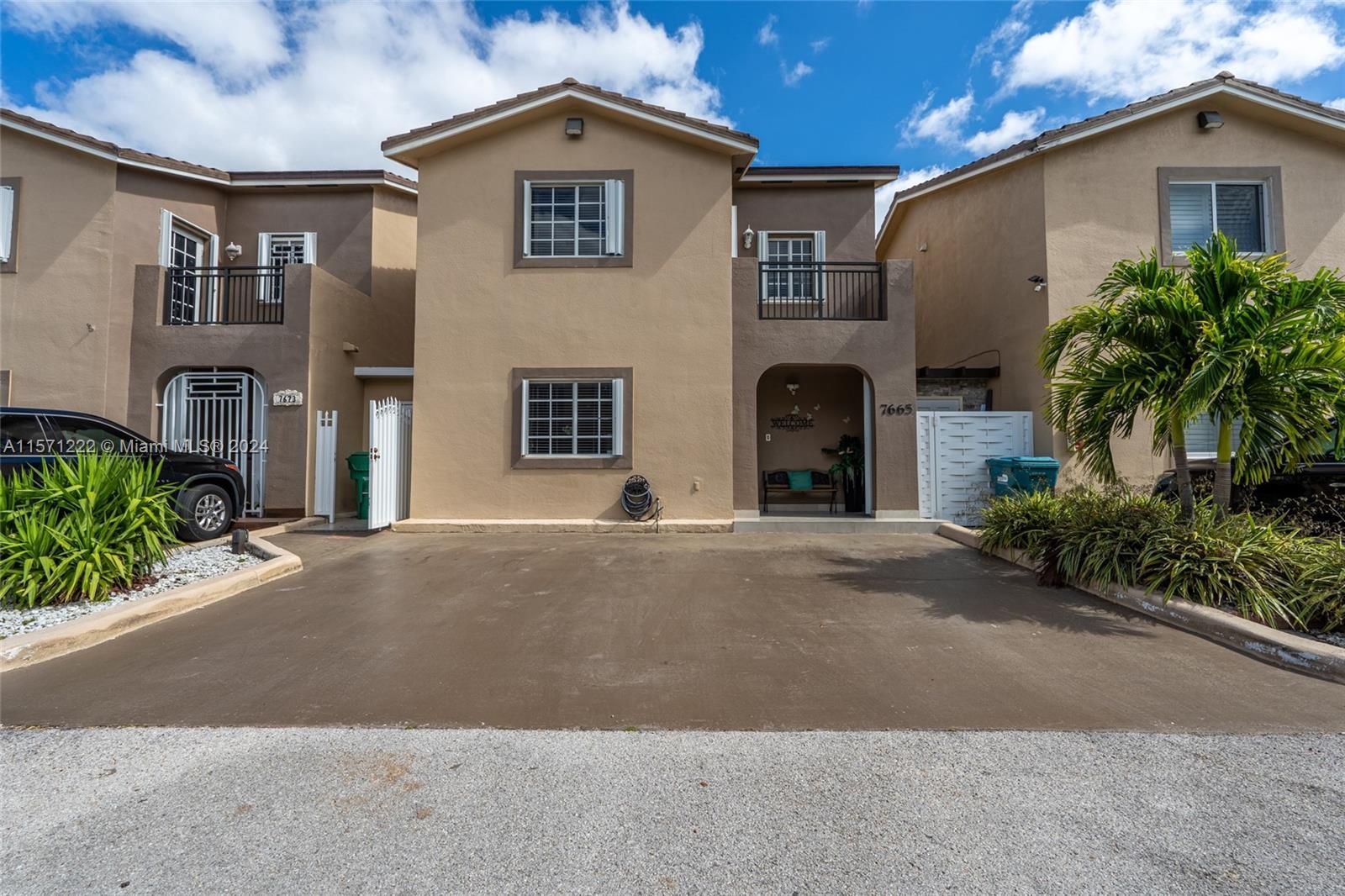 Stunning two-story townhome in Hialeah offers a perfect blend of modern updates and convenience. The