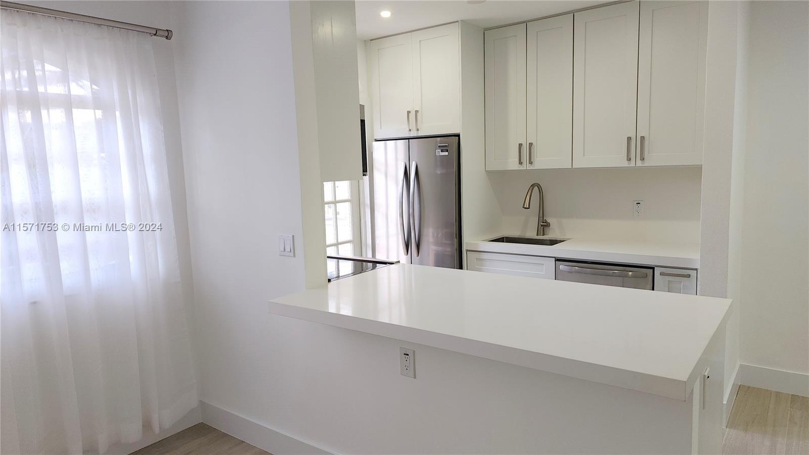 Gorgeous renovation at The Emerson House Condo! Everything is new and waiting for you just one block