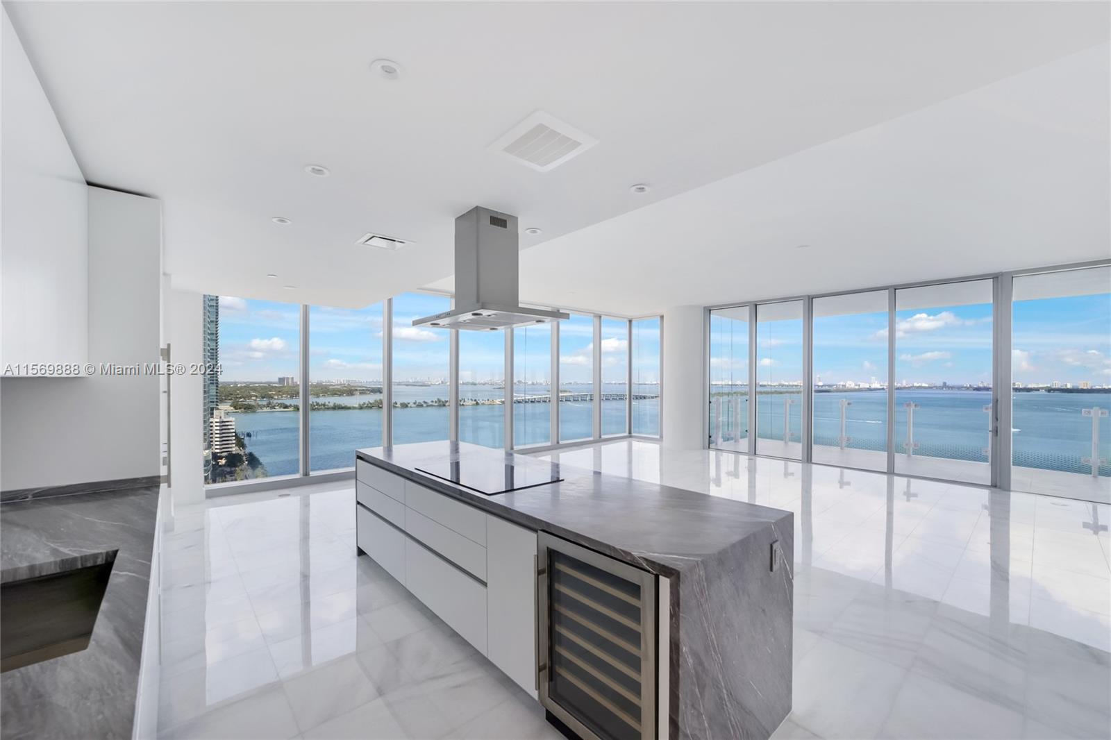 Experience waterfront luxury living at its finest in this stunning Missoni Baia model 01 condo. Perc