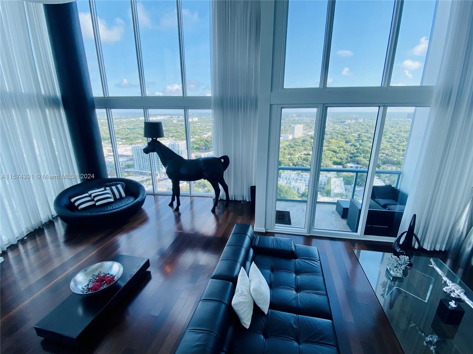 Extraordinary corner Penthouse at the Blue Condo furnished and decorated by French fashion designer 