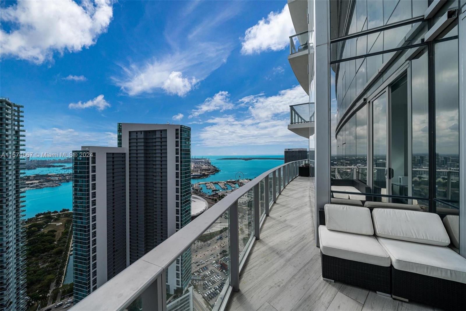 Welcome to the absolute most stunning 2bed/3bath + den with direct water view on one of the highest 