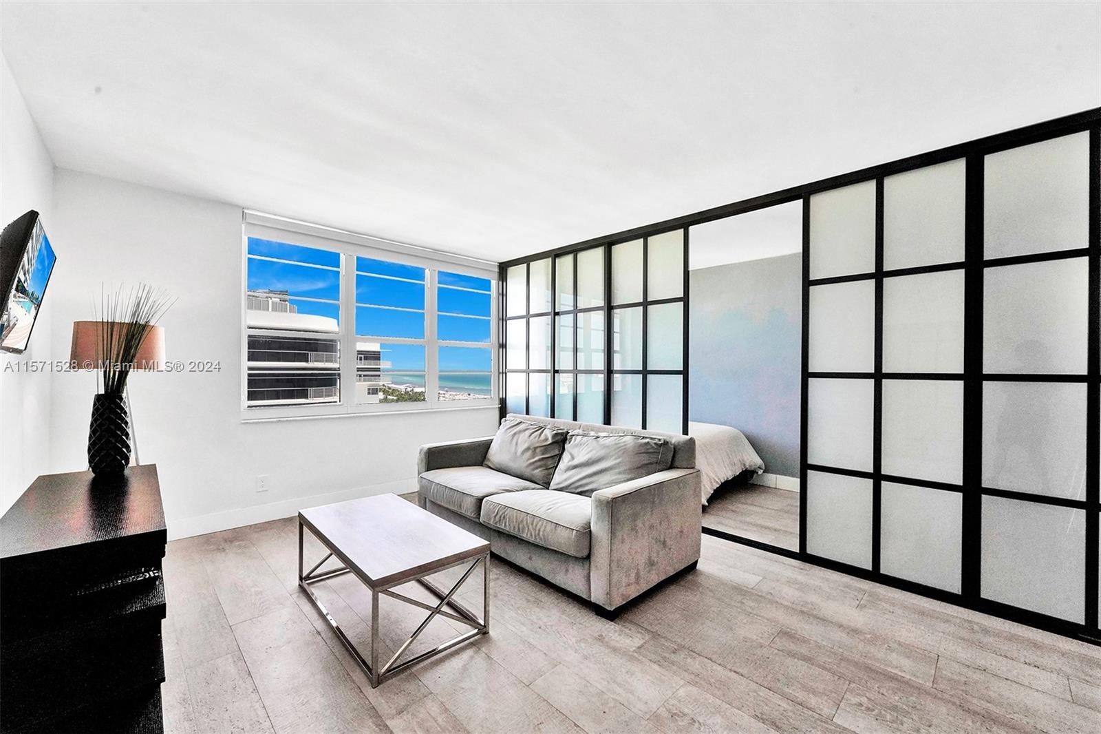 Substantially remodeled Jr 1 bedroom with OCEAN VIEW! This unit features modern wood porcelain floor