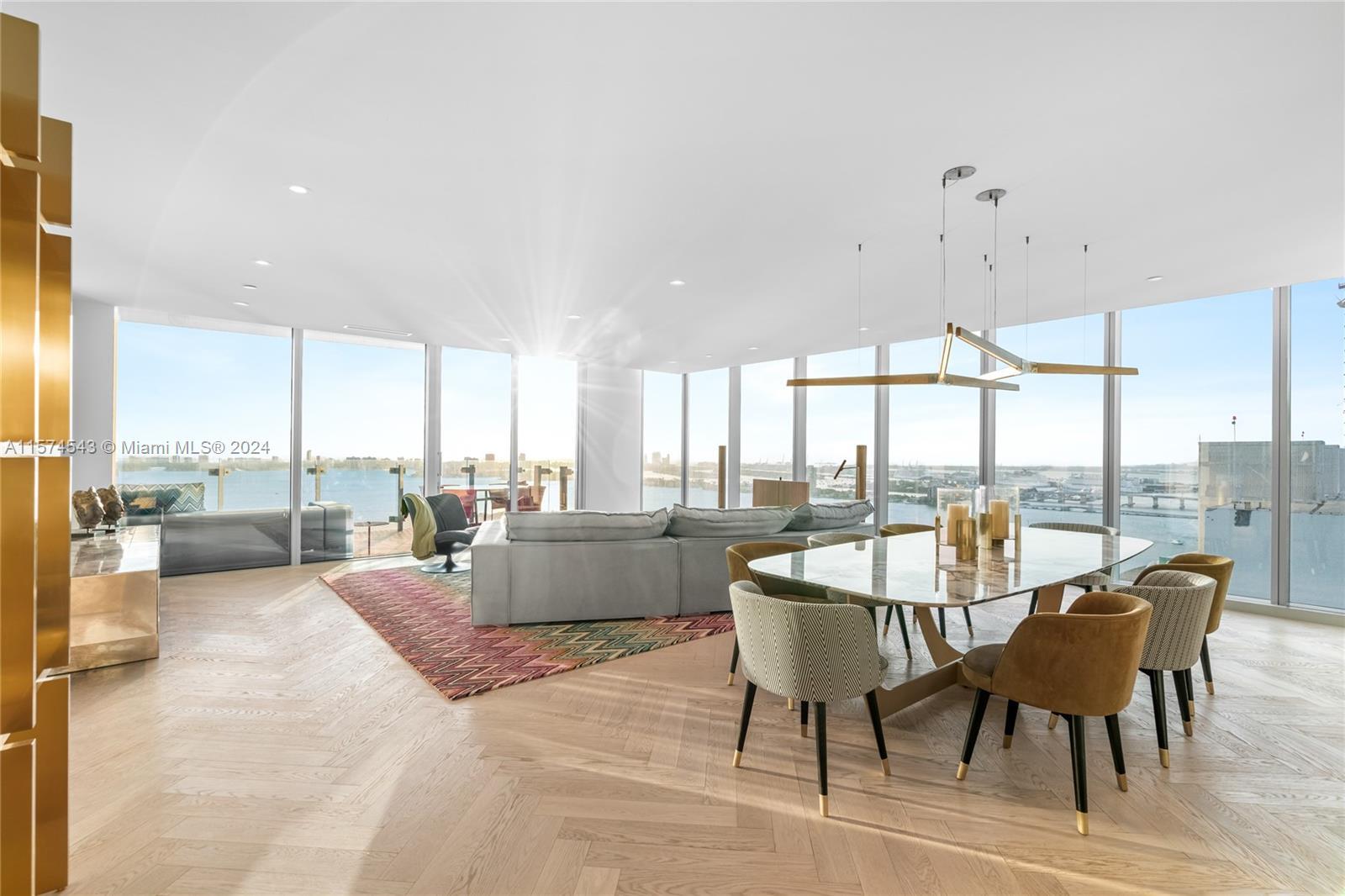 Welcome to this custom-made corner-unit waterfront residence. Located on the 30th floor and offers i
