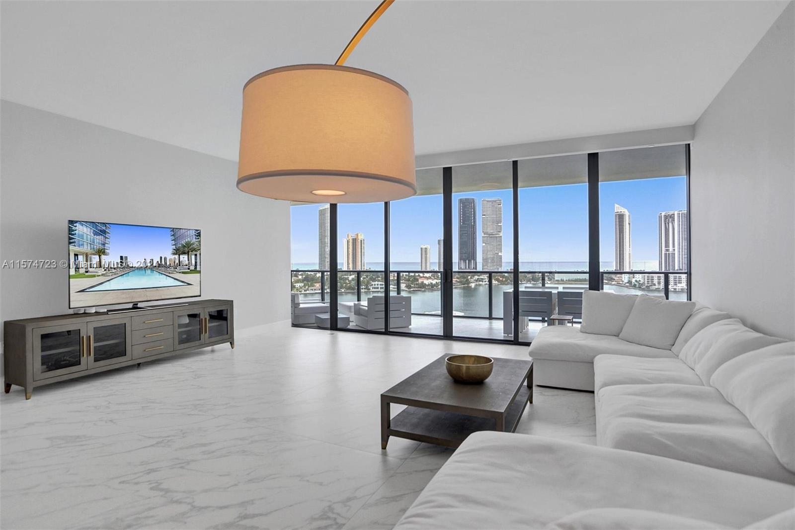 Immerse yourself in absolute luxury at 5500 Island Estates Drive, Unit 1107, Aventura, FL. This exce