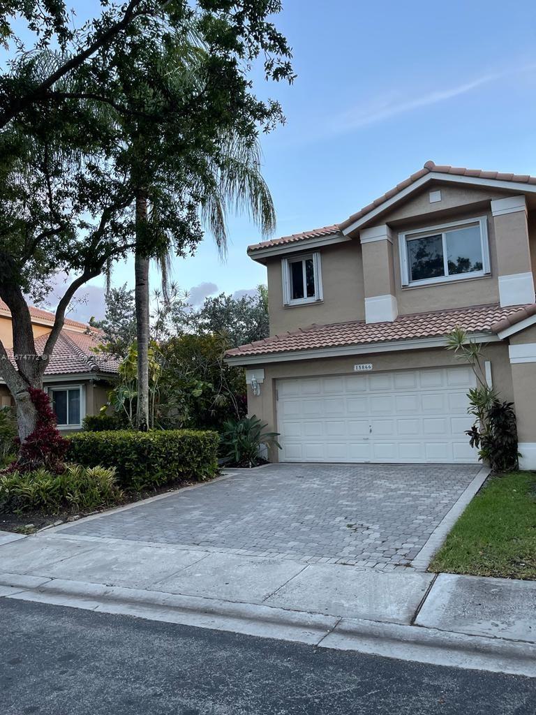 Located within the gated golf community of Grand Palms, this 3 bedroom, 2.5 bathroom home is ready f