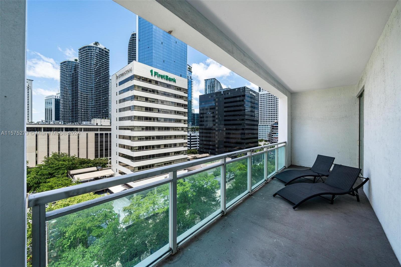 Experience luxury living at the Plaza! This 1-bed/1-bath unit showcases stunning skyline views and b