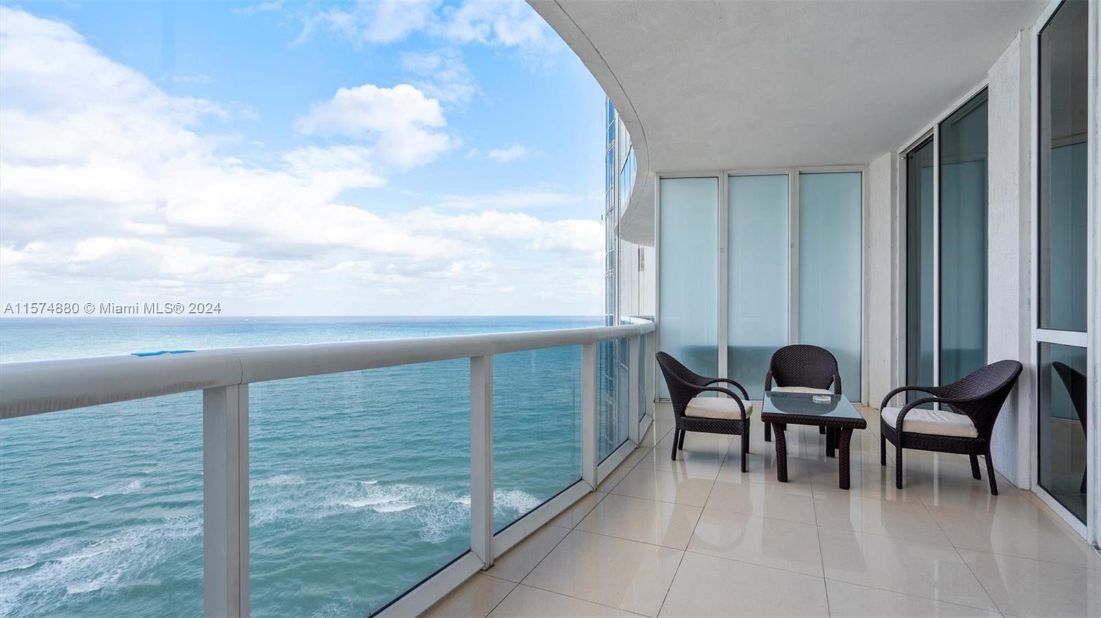 Enjoy stunning ocean views from this meticulously designed 3-bedroom, 3-bathroom beachfront property