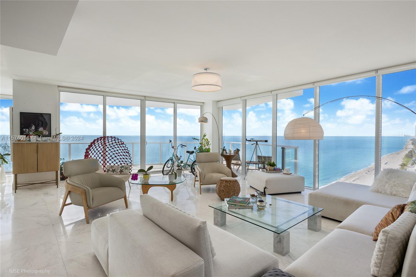 Experience the allure of the boundless ocean from this exquisite residence at Apogee Beach condo.  W