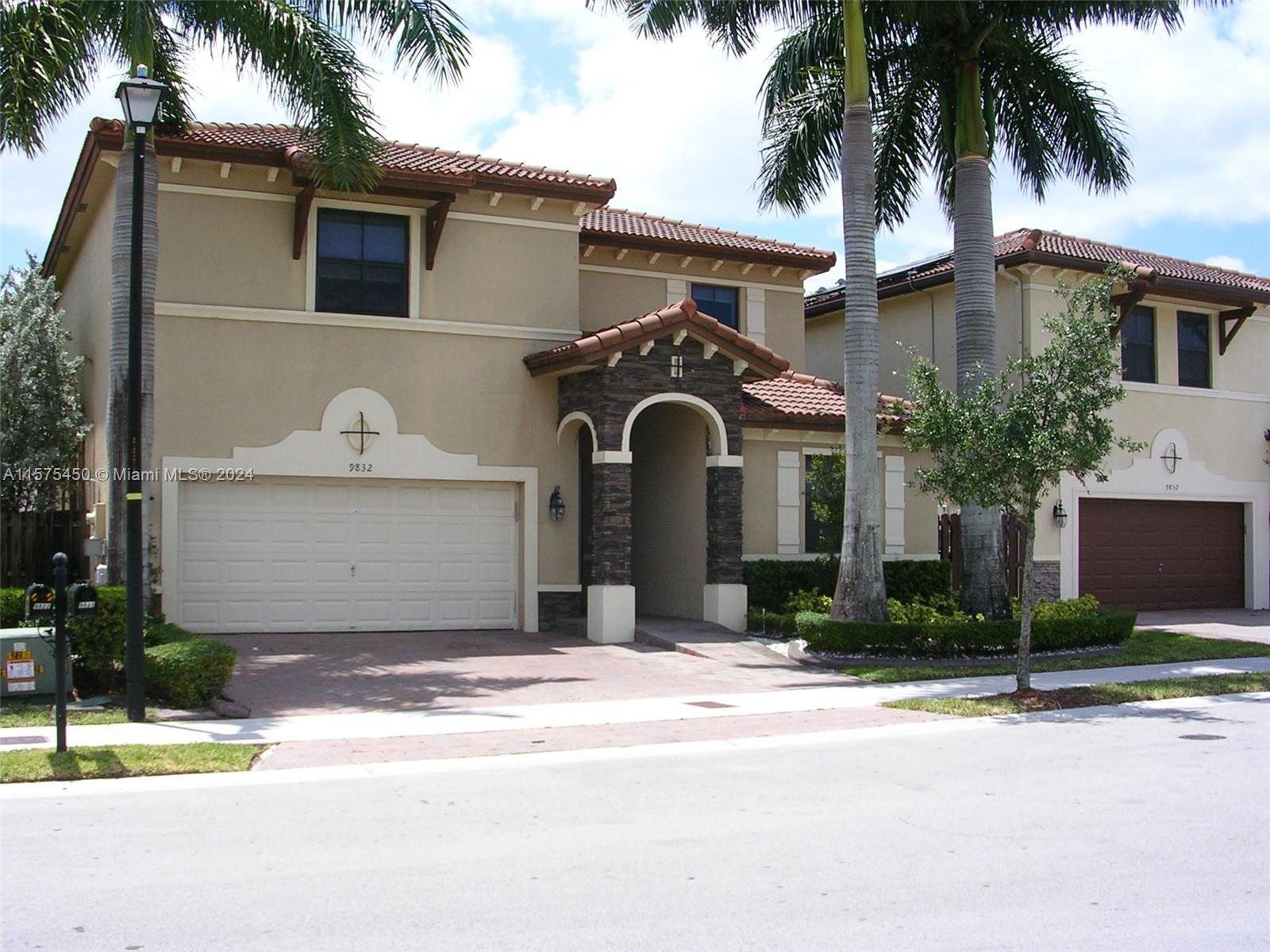 Single family home sophisticated and elegant in the heart of Doral at prestigious Grand Bay Estate. 