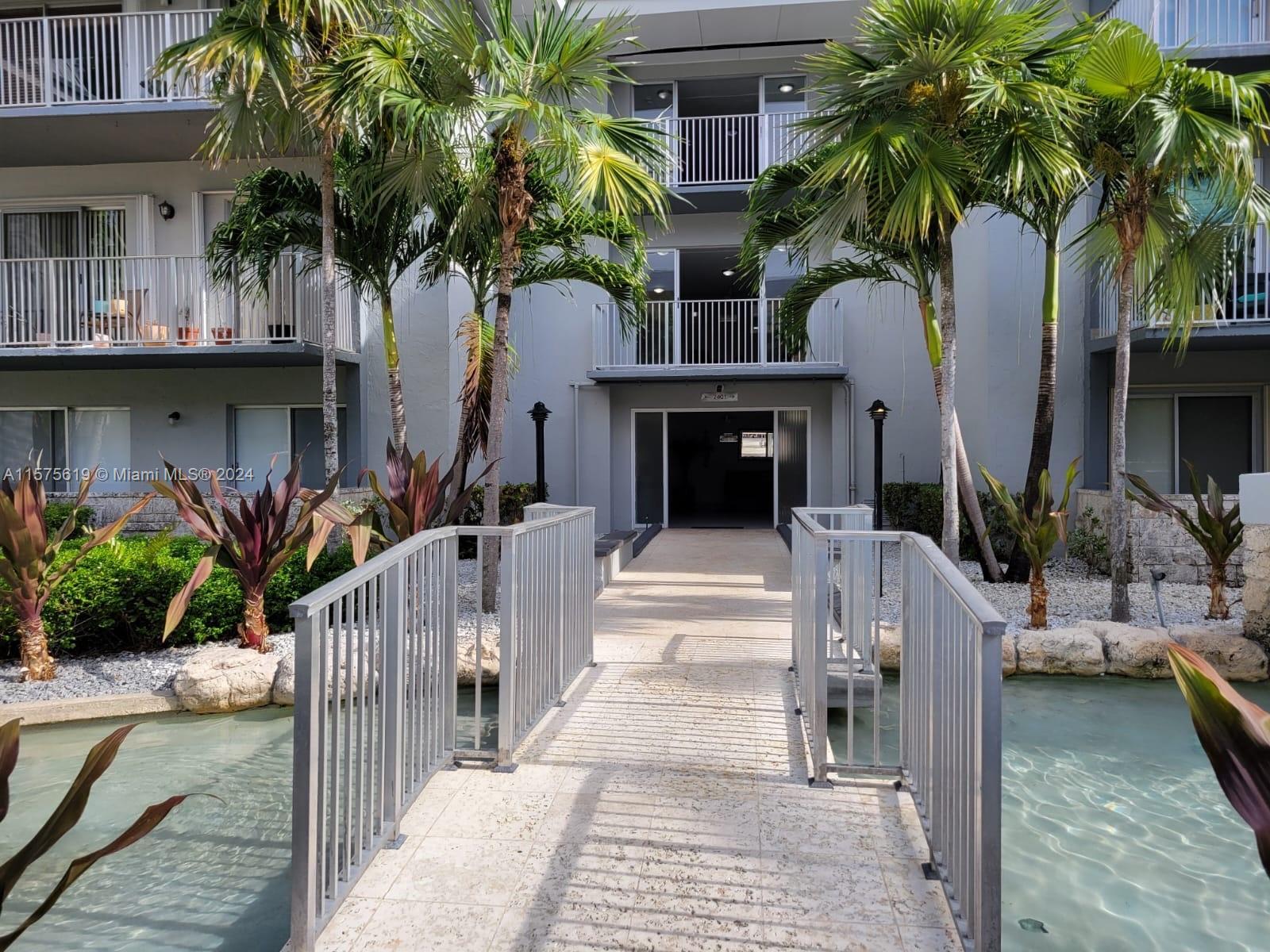 Welcome to the epitome of convenient living at Silver Palms in Dadeland! Seize the rare opportunity 