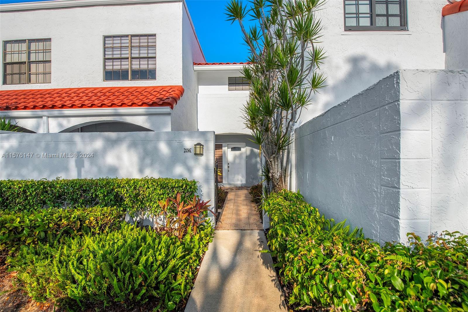 ATTENTION TO DETAIL! This modern, remodeled two-story townhome w. large front and back private patio