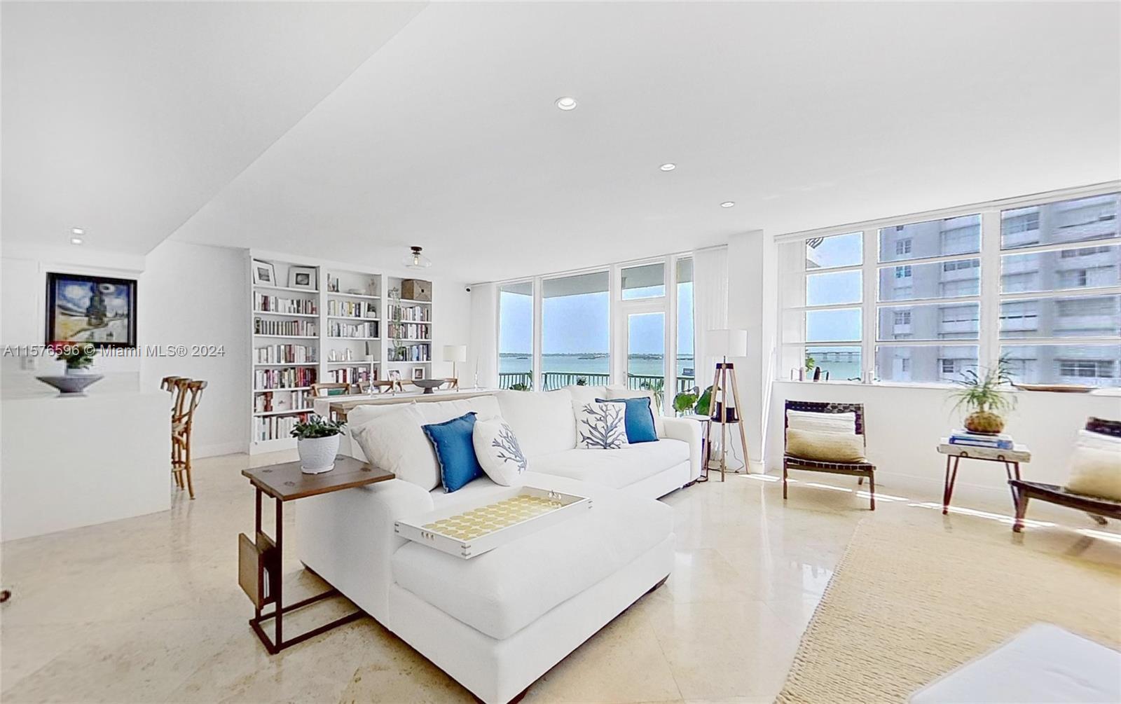 Stunning WATERFRONT RESIDENCE in the coveted Brickell Bay Tower! Exquisite two-story property! Elega