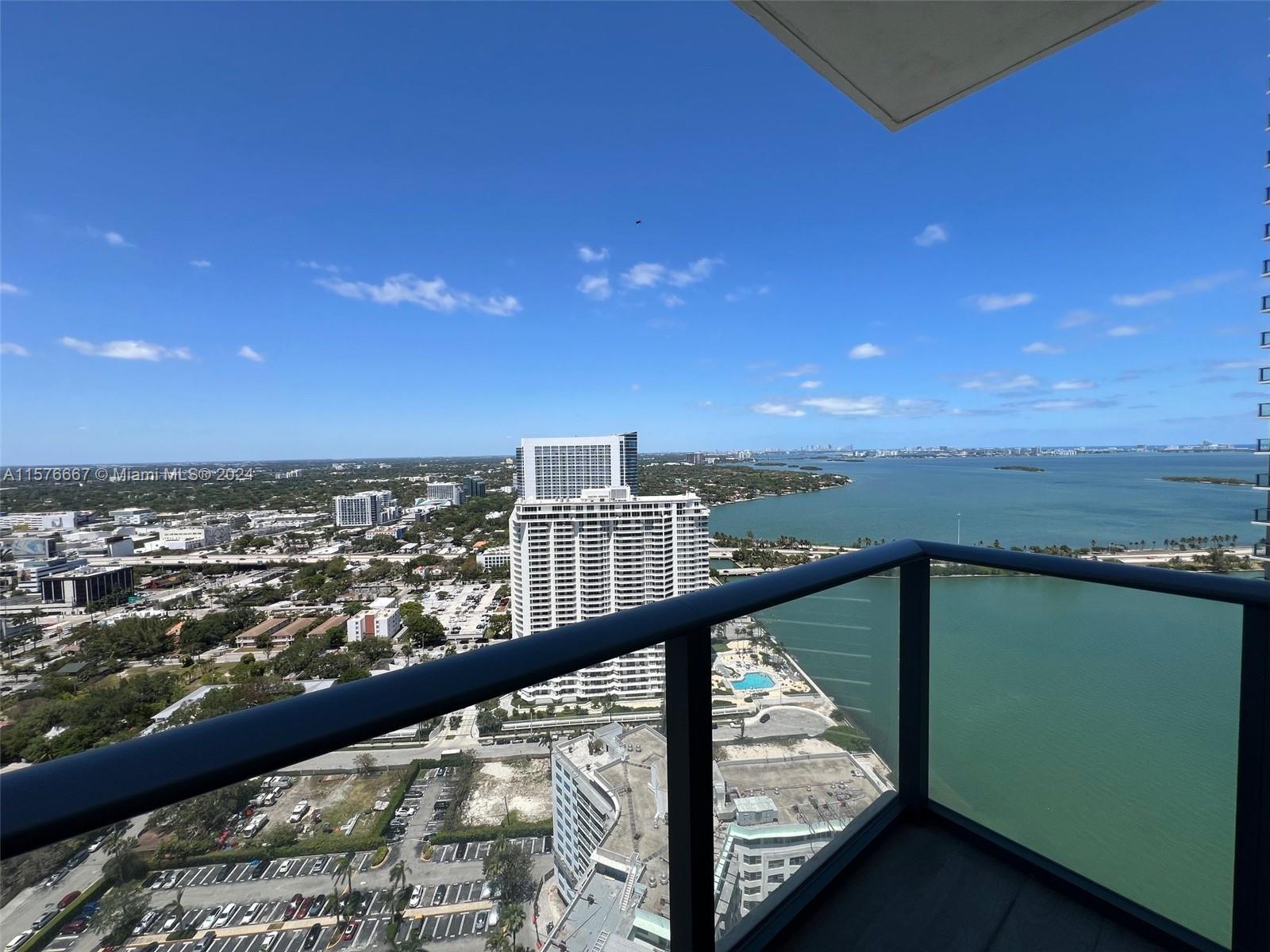 Amazing corner unit 1 bed | 1.5 bath direct breathtaking water views of Biscayne Bay. Blinds and bla