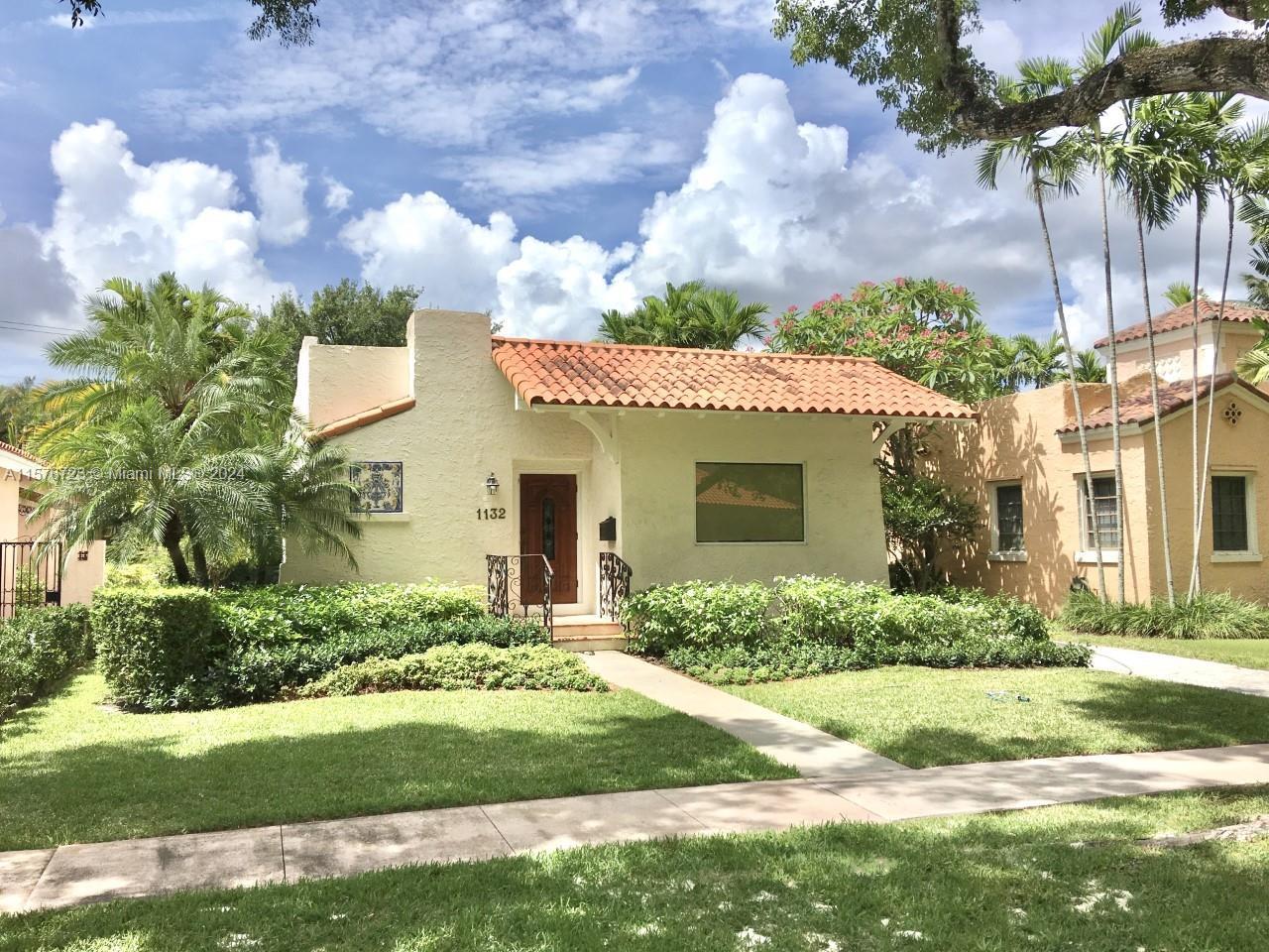 Situated in a PRIME location, on a beautiful, tree lined street in Coral Gables, this historic home 