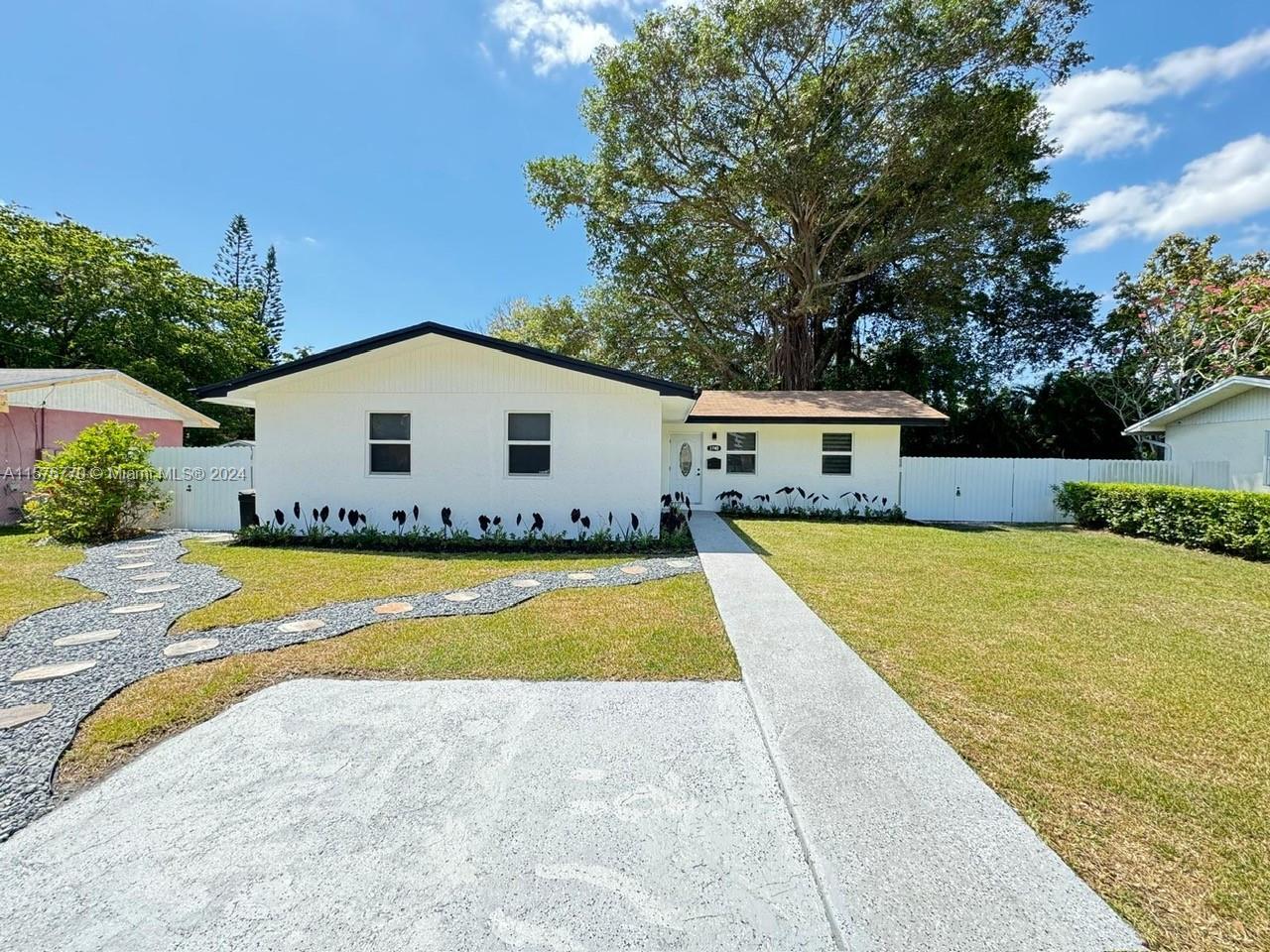 BEAUTIFUL, COMPLETELY REMODELED 3/2 IN COCONUT GROVE!!! IMPACT WINDOWS, NEW FLOORS, NEW KITCHEN WITH