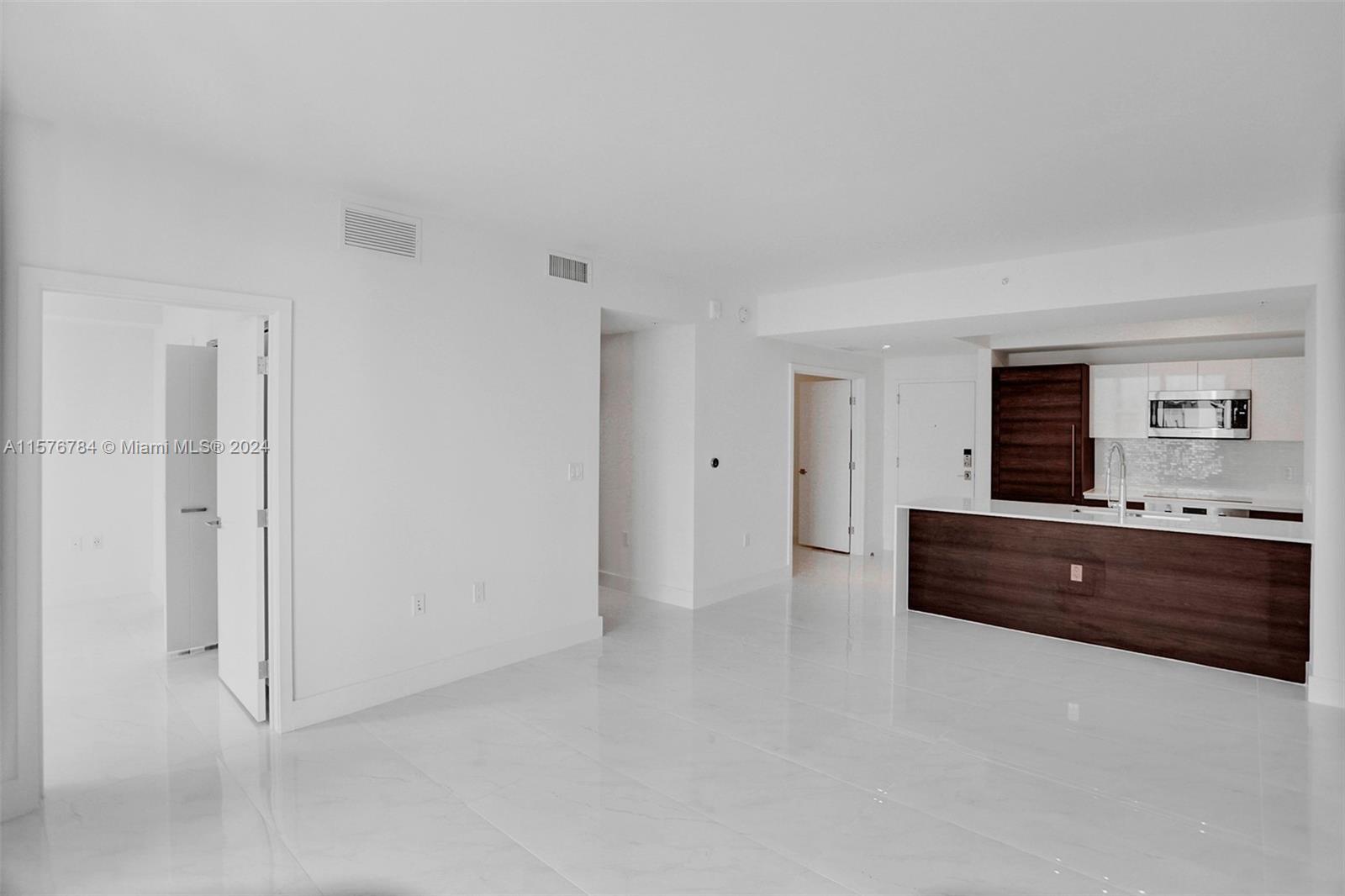AVAILABLE NOW. SPACIOUS 1 BD+DEN/1 BA UNIT WITH GREAT VIEWS. Live in the premier new development of 