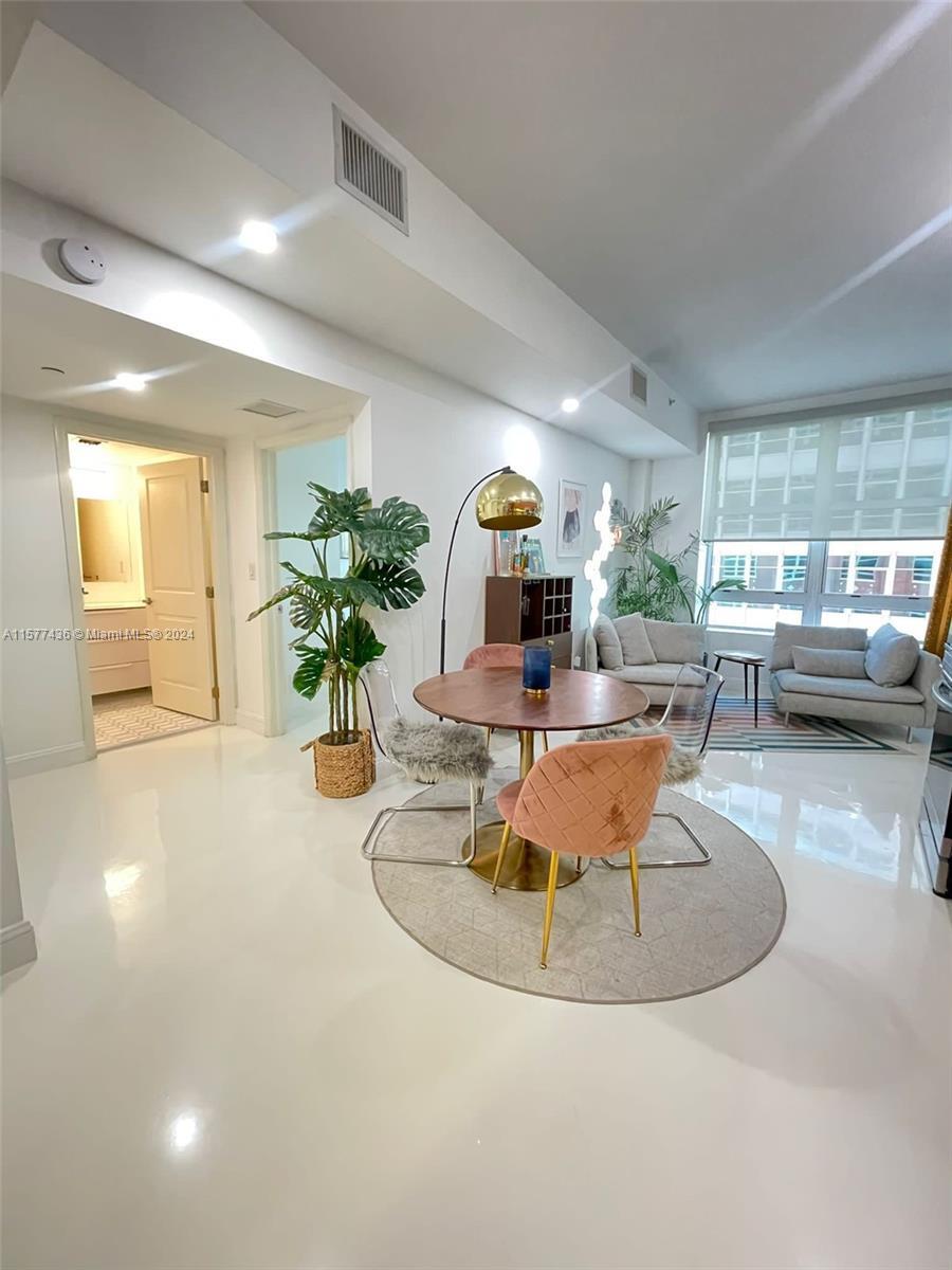 Experience downtown living in this beautifully remodeled apartment, ready to move in. Featuring impa