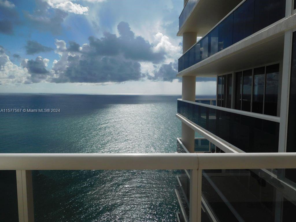STUNNING direct ocean views from this 34th floor 2BR/2BA corner unit in the luxurious BEACH CLUB. Un