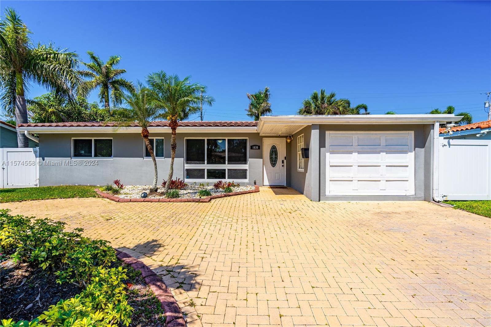 Welcome to your tropical paradise just minutes from the sandy shores of Deerfield Beach, Florida! Th