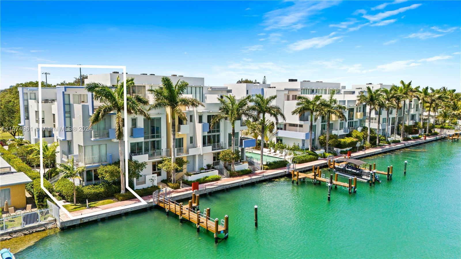 Indulge in waterfront luxury with this elegant 3Bed/3.5Bath townhouse corner unit + rooftop terrace.