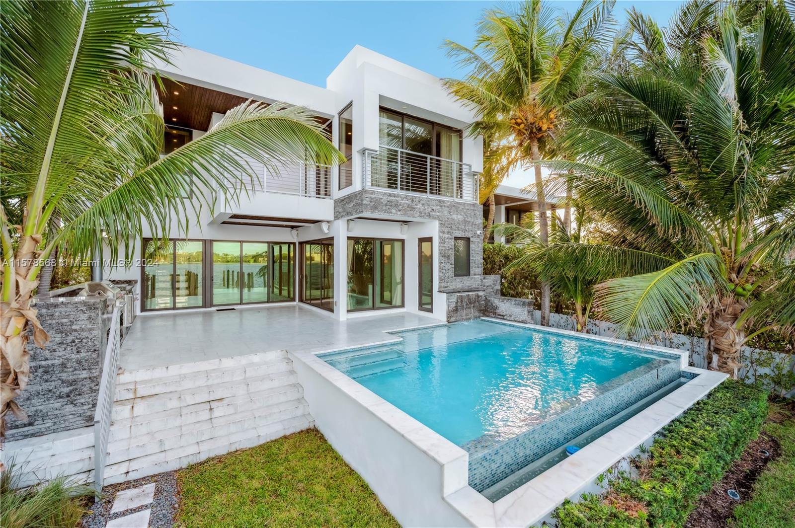 What an incredible location! Being in a gated community in Miami Beach, neighboring Indian Creek, on