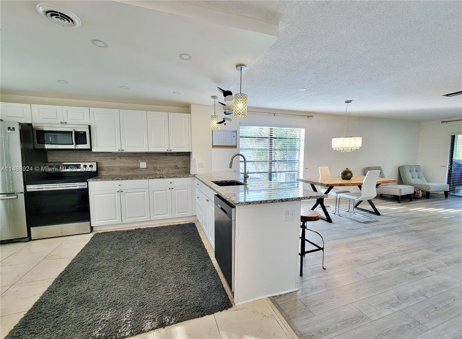 Welcome to your tranquil retreat in Boca Raton's sought-after 55+ community. This charming 2-bed, 2-