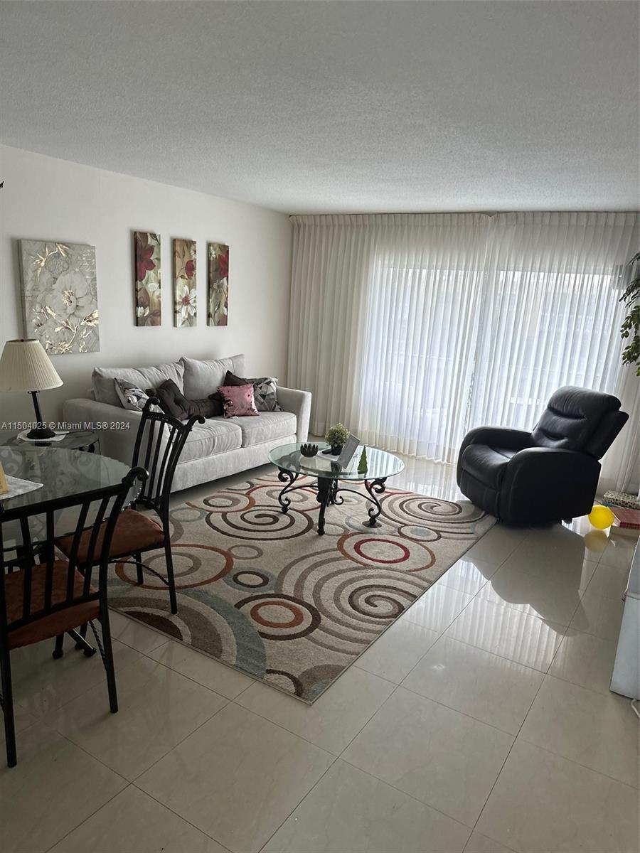 Gorgeous and ample two bedroom two bathrooms condo in highly desirable Hallandale Beach, just a few 