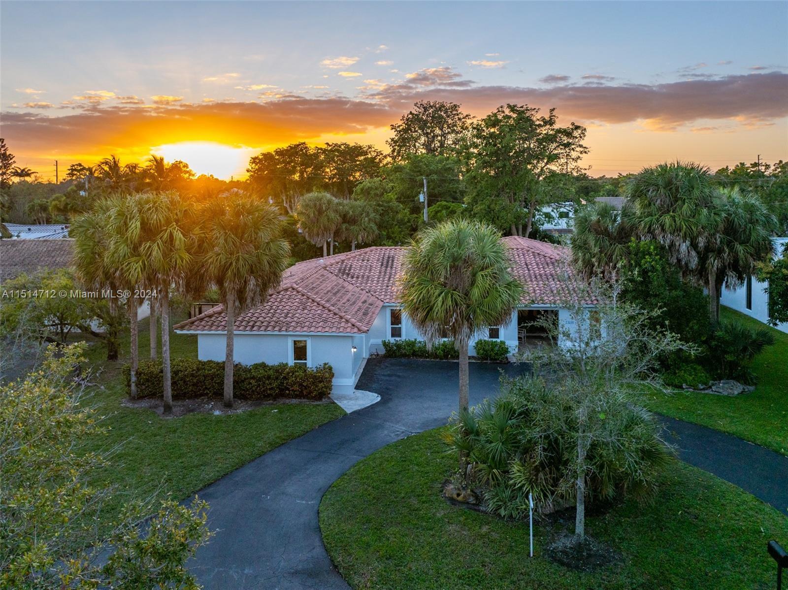 Rare gem available in the coveted guard gated S. Gables Kings Bay community. This warm and inviting 