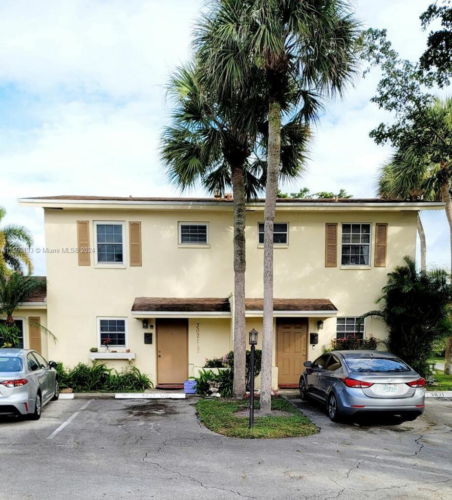 This spacious 3 bed 1.5 bath townhouse is largest townhome in Palm Aire Village 1, with all the bedr
