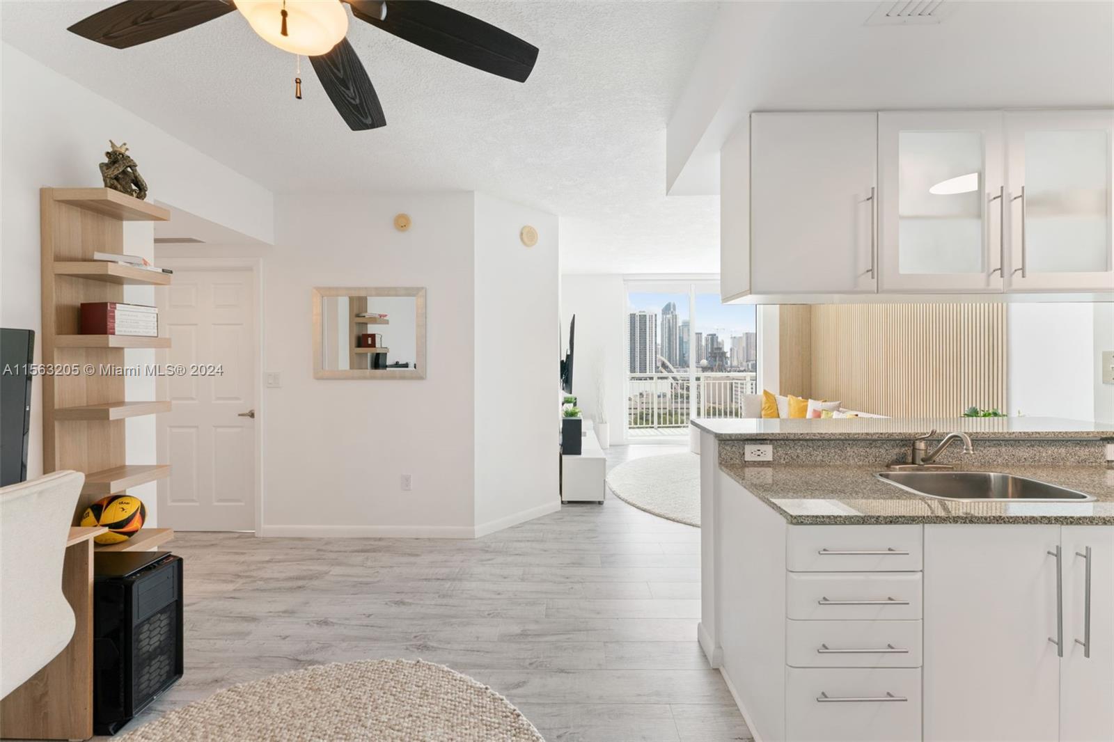 Completely remodeled penthouse unit in Edgewater, Miami, featuring an open balcony with stunning cit