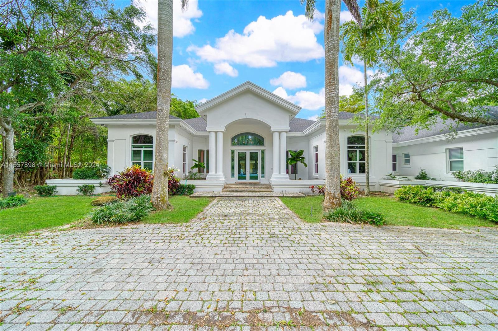 Beautiful 1-Story Executive home in the heart of North Pinecrest! This home features 7 Bedrooms 7.5 