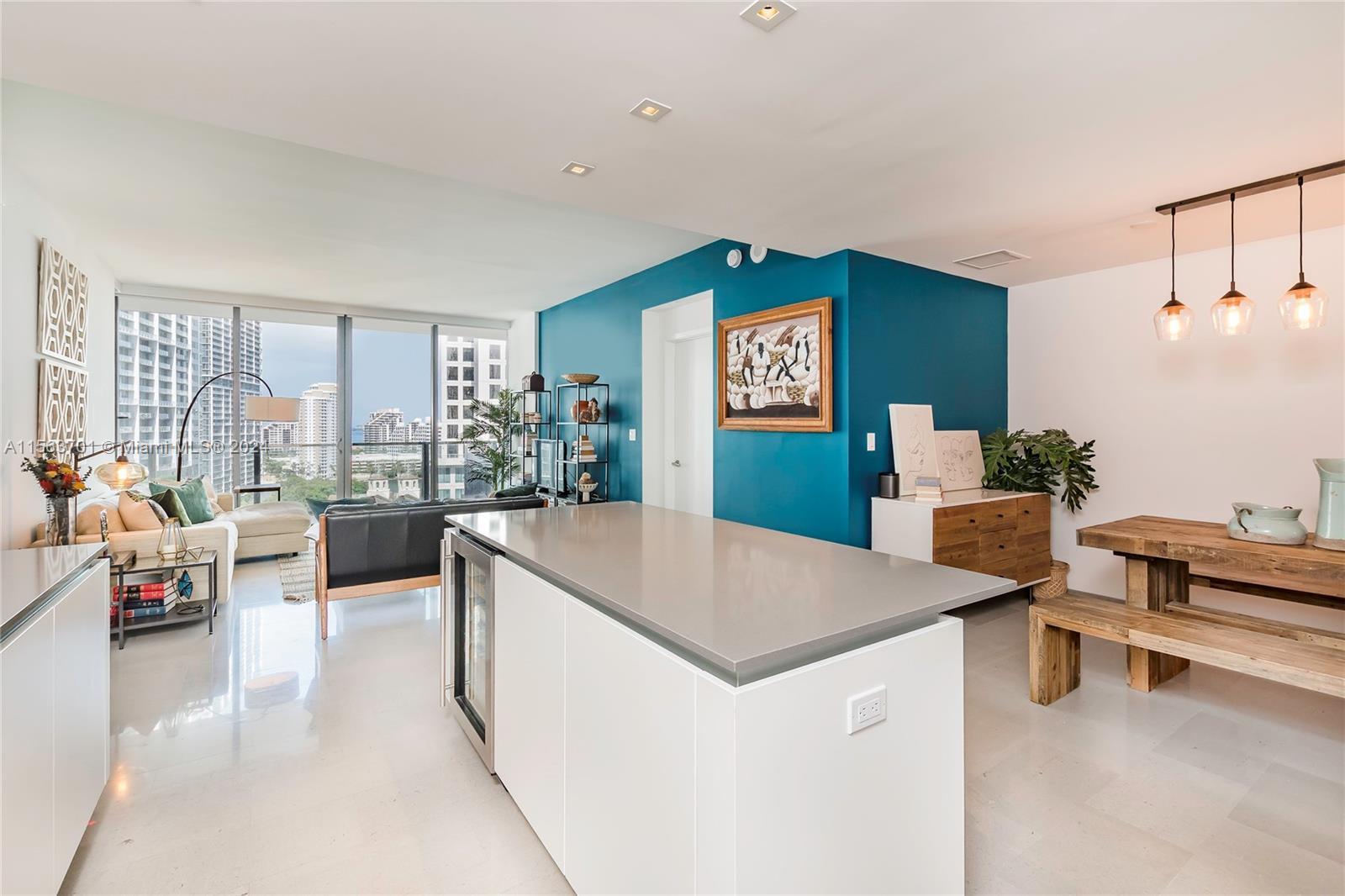 Welcome to this spacious 2 bed 2.5 bath, 1,400 SF Unit in the heart of Brickell. This property is tu