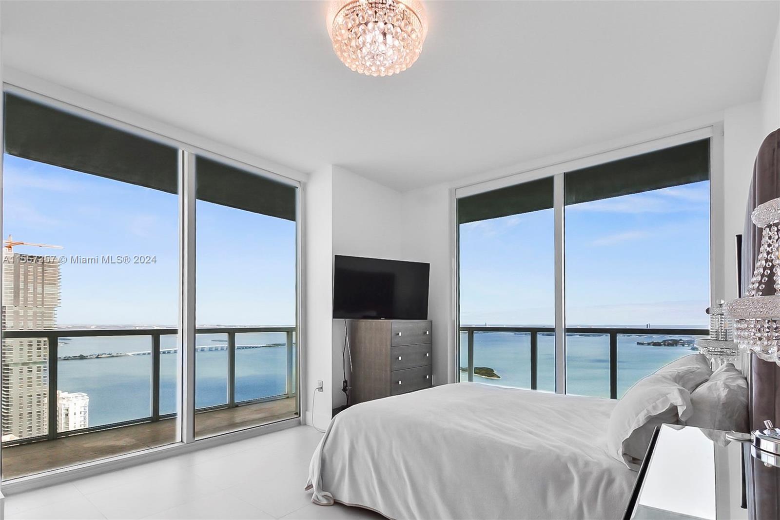 Rarely available direct water view 2 bed & 2.5 bath at Quantum on the Bay in coveted exterior corner