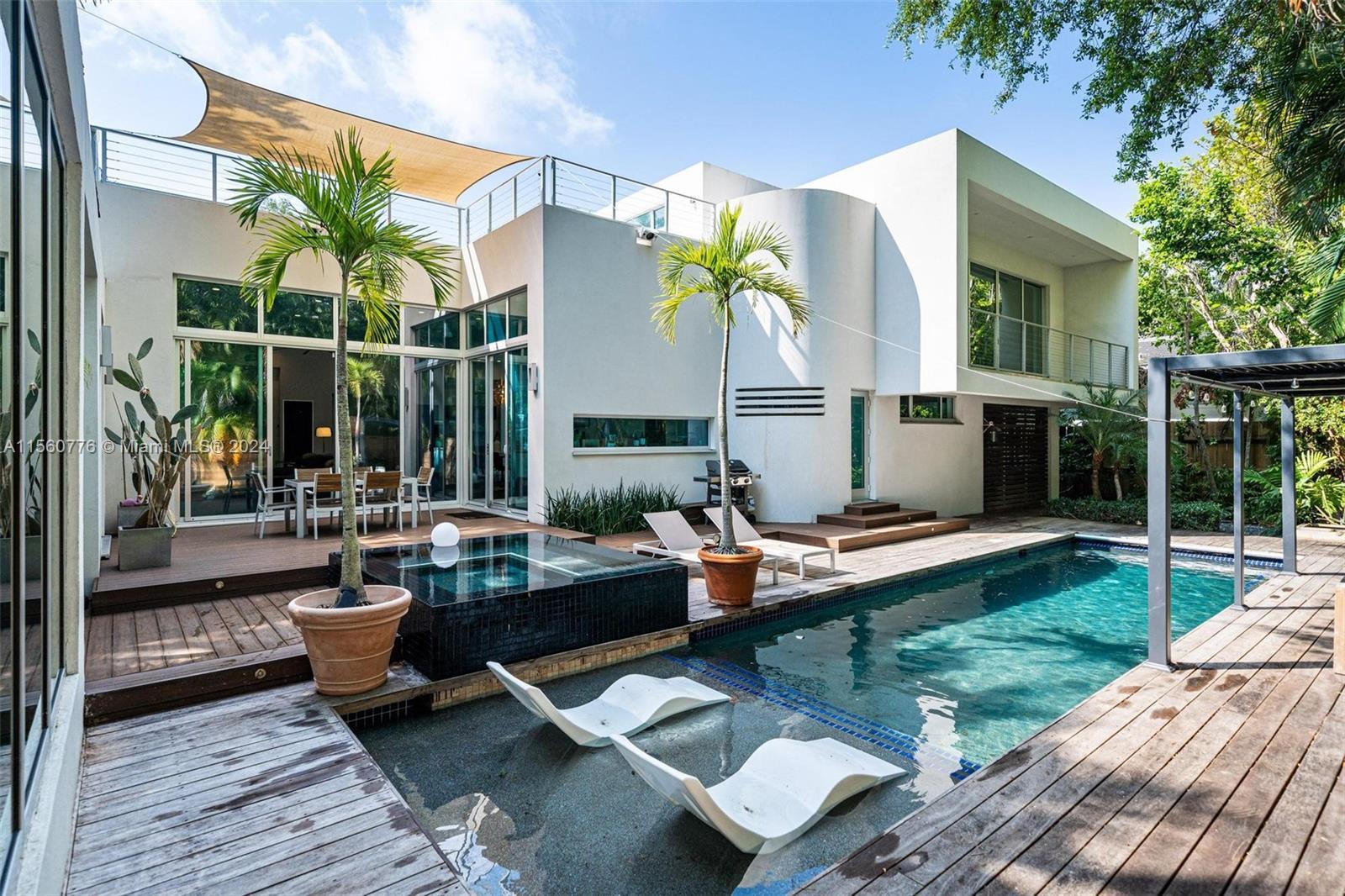 Discover this ultra-chic, gated contemporary gem in the sought-after Grove area.
The sophisticated 