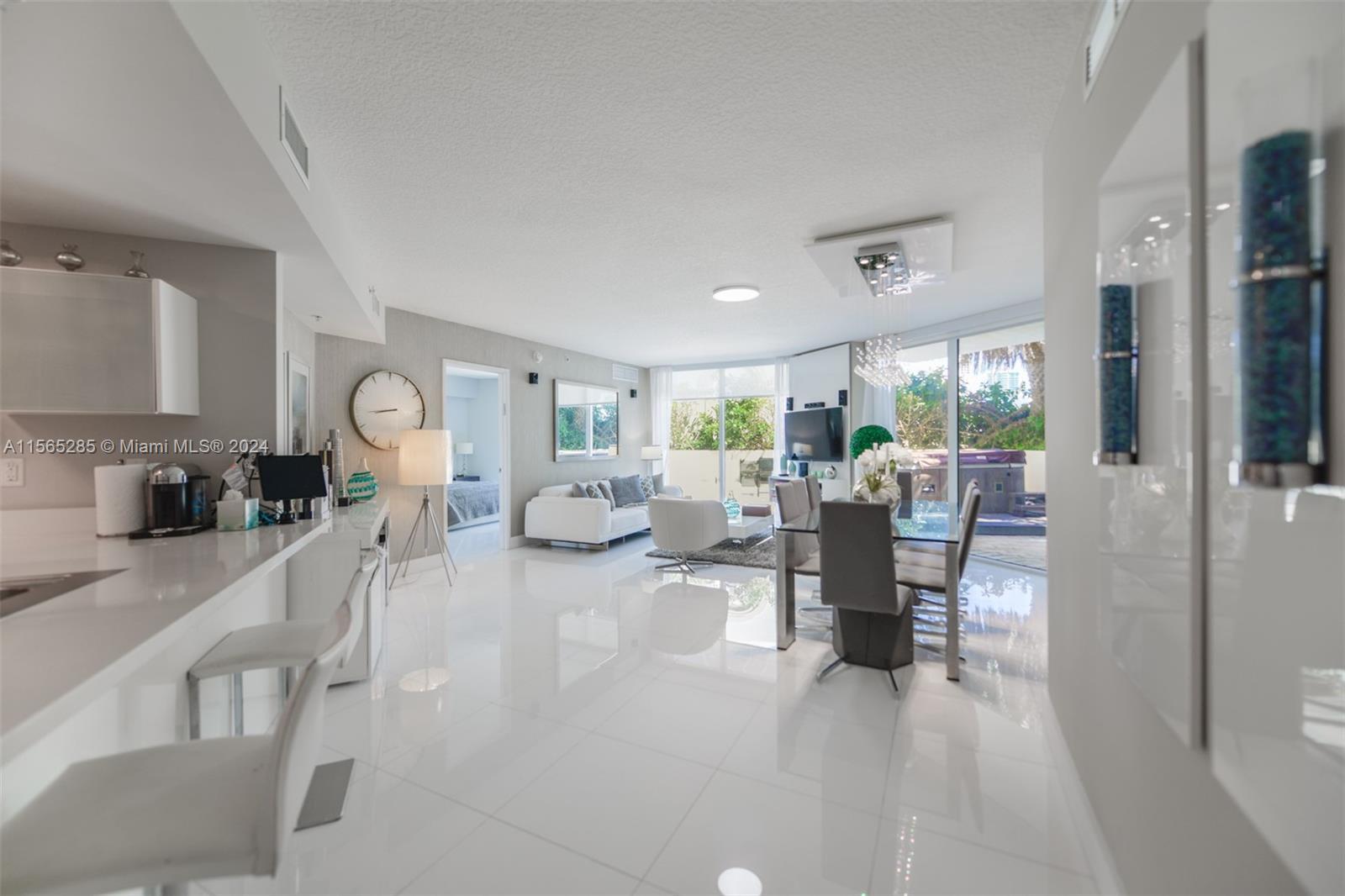 Located in heart of Sunny Isles this beautiful Model Lanai Unit, + guest suite on site. St. Tropez i