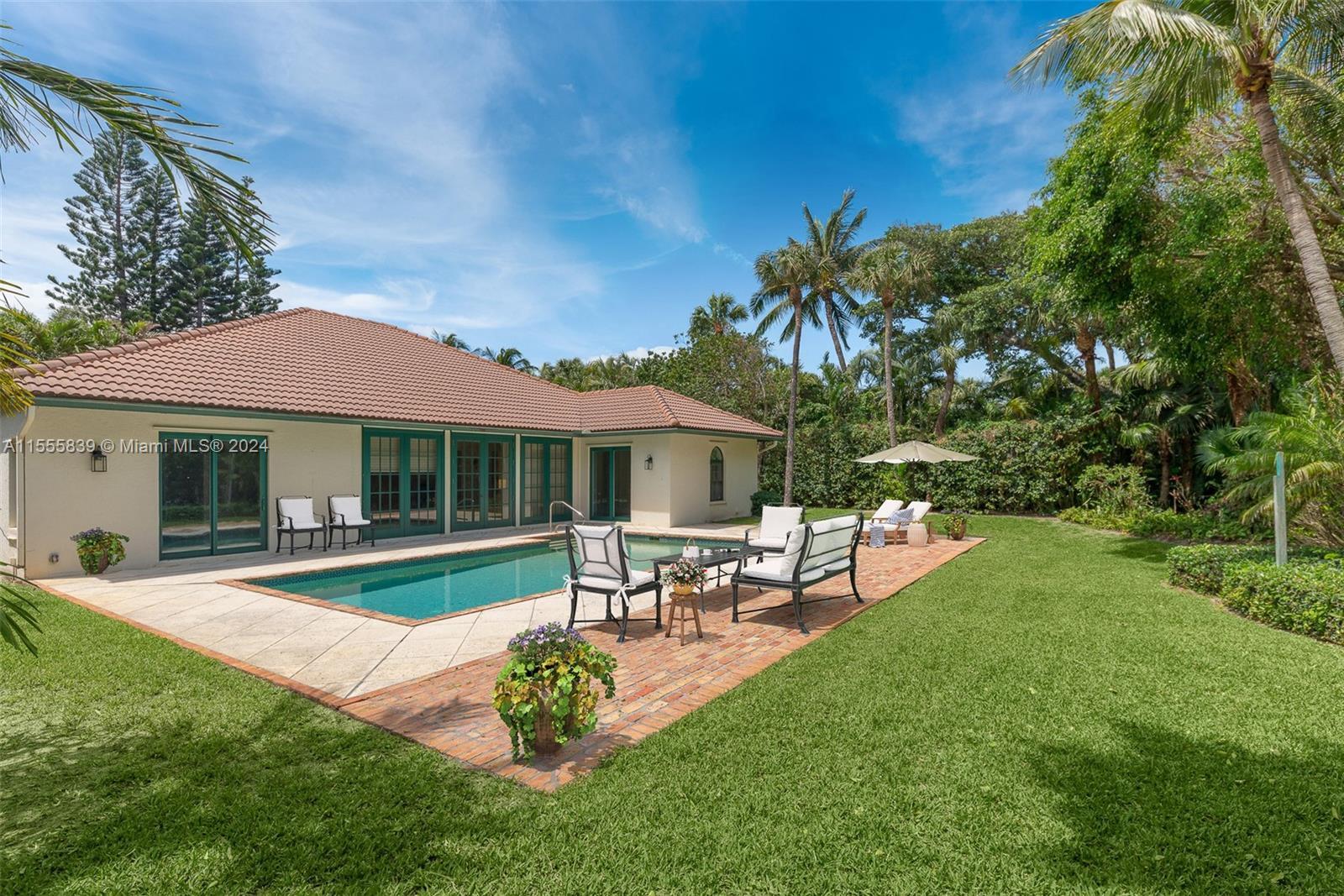 Situated on Jupiter Island, this charming property offers an inviting atmosphere. This CBS home Feat