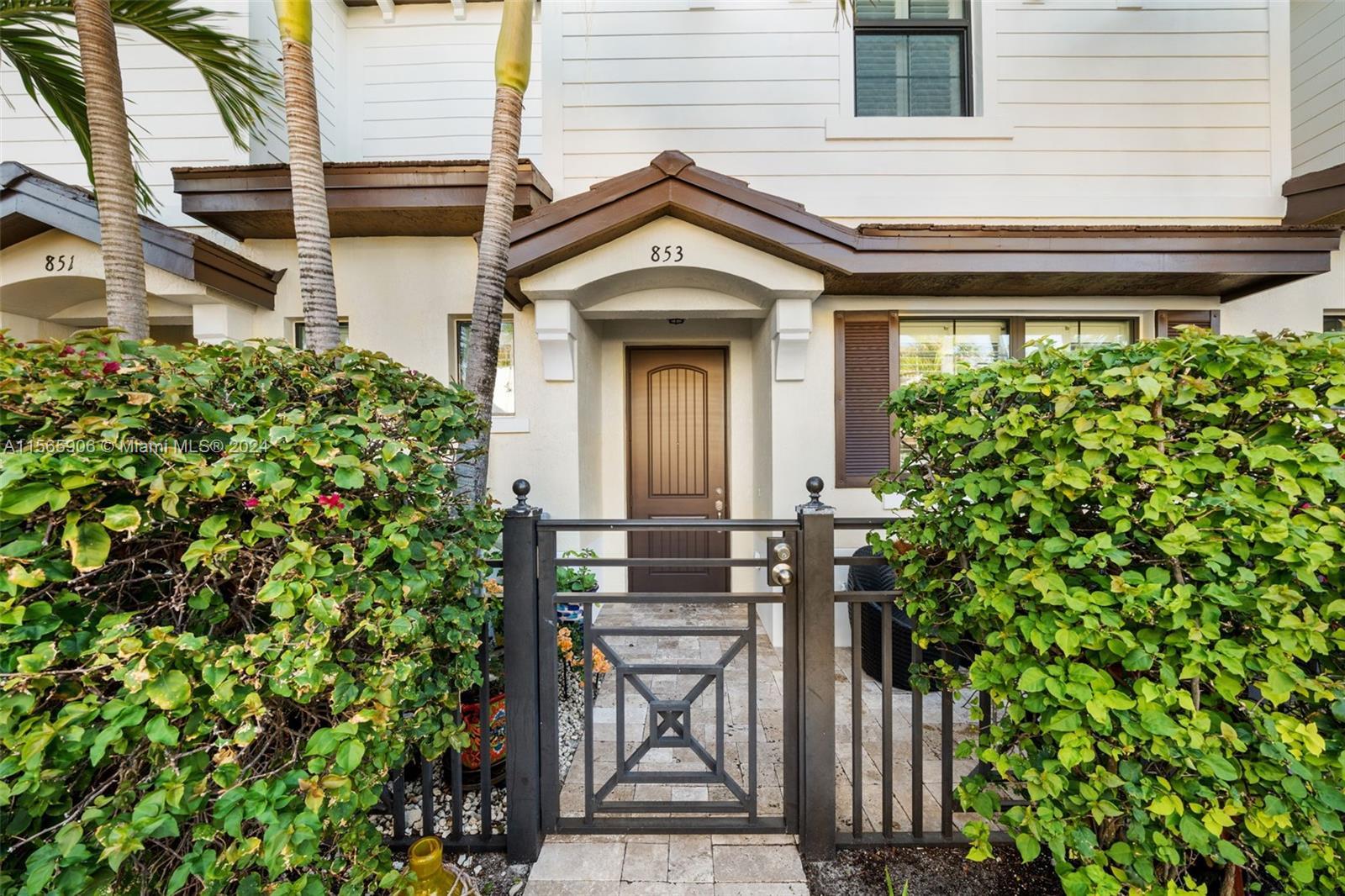 Steps to the beach. This luxurious 3-bedroom, 2 ½-bathroom townhome, nestled in a quaint beachside c