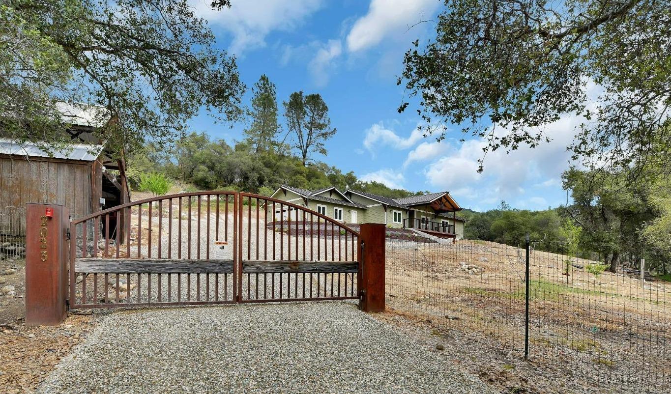 Welcome home! This 3.28 acre property is gated and fully fenced. Just five minutes from downtown Murphys.